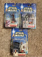 Front view of all three sealed figures