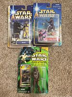Front view of all three sealed figures: Bossk, Zam Wesell, Chewbacca
