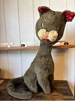 Front view of Dollcraft Boo Boo Kitty plush cat showing facial features, ears and seated posture