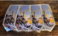 All four lighthouse glass panels side by side