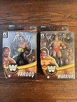 Front of both sealed action figure boxes: Farooq and Ultimate Warrior