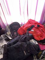 Overview showing SwissTech jacket, Columbia pant, OshKosh bib