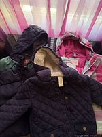 All three jackets displayed front view