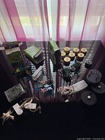 Overall lot: multiple string lights, tea lights, battery boxes, spools and boxes displayed