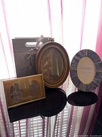 All three frames standing together