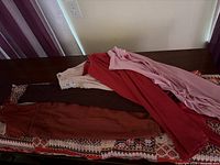 All six folded tops showing colour assortment