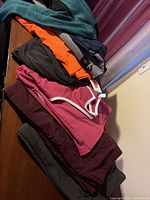 Stacked view of all seven garments