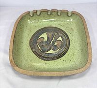 Top view showing overall form, glaze, rests, and central design
