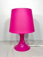 Front view of IKEA LAMPAN table lamp, shade and base visible