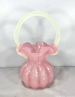 Full view of pink glass basket with opalescent handle