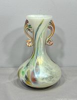 Front view showing overall vase shape, colour swirls and handles
