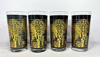Four tumblers side by side