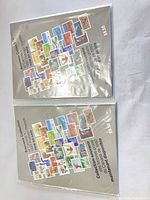 Two sealed souvenir stamp booklets front view