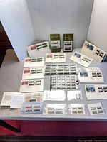 Overview of entire lot showing panes, covers, bulletins