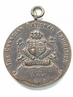 Obverse showing coat of arms, event legend, award text, suspension ring