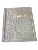 Front cover of black hardcover album with gilt Album title