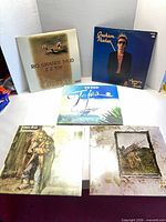 Front covers of all five LPs laid out together