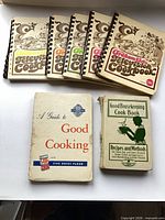 Overview of all seven cookbooks laid out
