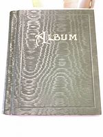 Front cover of black textured stamp album titled "Album"
