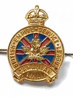 Front view of gold-tone Royal Canadian Legion enamel badge showing crown, maple leaf, enamel colours