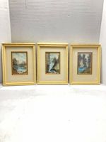 Front view showing all three framed paintings