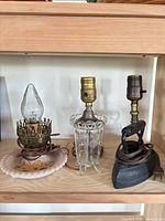 Front view of all three lamps showing bases, sockets and cords