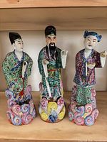 All three porcelain figurines front view