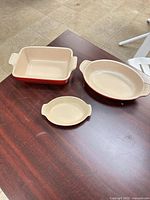 Top view of all three baking dishes showing interiors and sizes