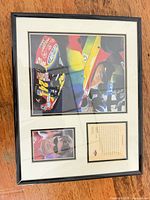 Framed limited edition Jeff Gordon NASCAR print showing car, portrait, plaque, mat and frame