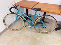 Full left side view of blue Schwinn Sprint road bike showing overall condition
