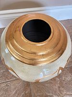 Top view showing wide opening and gold banding