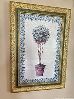 Full view of one framed topiary print showing artwork and frame