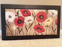 Front view of framed floral wall art