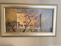 Front view of framed wall art showing entire composition and frame