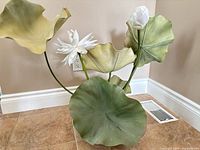 Front view of artificial lotus plant showing leaves, flower, bud and ceramic pot