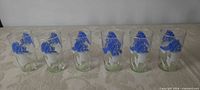 Front view of all six iris juice glasses lined up