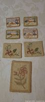 All seven hooked coasters displayed together on table