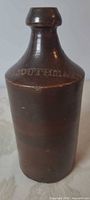 Front view showing embossing and glaze