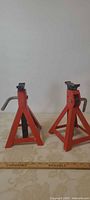 Pair of red jack stands front view