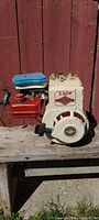 Front view showing Briggs & Stratton branding, 2.5 HP decal, recoil starter, fuel tank and air cleaner
