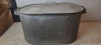 Front view of galvanized wash boiler with lid attached