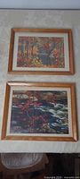Both framed prints shown hung together