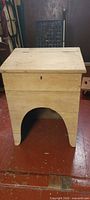 Front view showing full desk and arched knee opening