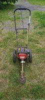 Front overall view of Southland wheeled trimmer on grass