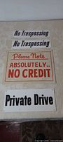 Front view of all four signs