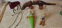 Group view showing all four vintage toys