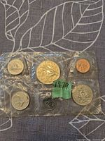 Obverse sides of six 1979 Canadian coins in original cellophane