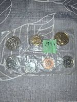 Front view of sealed strip showing six 1999 Canadian coins