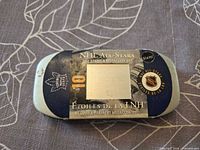 closed tin showing NHL All-Stars 2001 Stamp & Medallion Set label