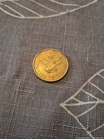 Reverse side of 2006 Canadian 1 dollar coin